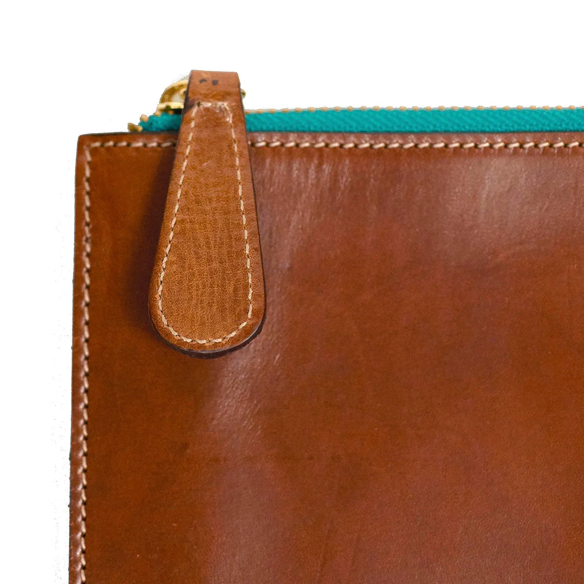 Brown leather portfolio with green zipper